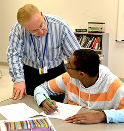 private special education school nj - student with teacher at The Children's Institute High School