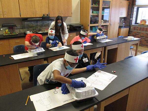 North Hudson Acaemy students working in the biology lab