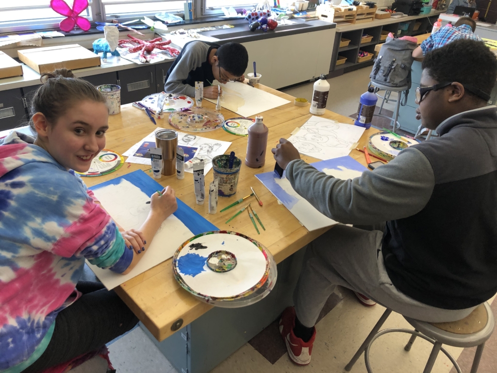 CEA School Students working on art projects together
