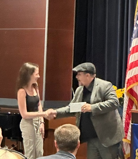 Emily McLaughlin, accepting her Connections to the Future Scholarship award recently.