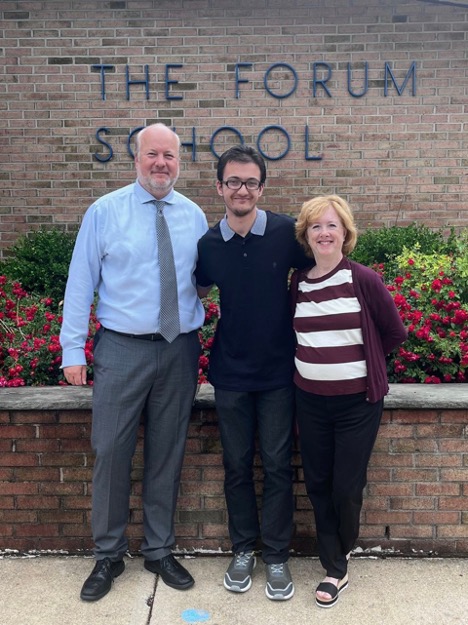 Siddharth James, center, with Forum School Executive Director, Brian Detlefsen, left, and Diane Somers, right.